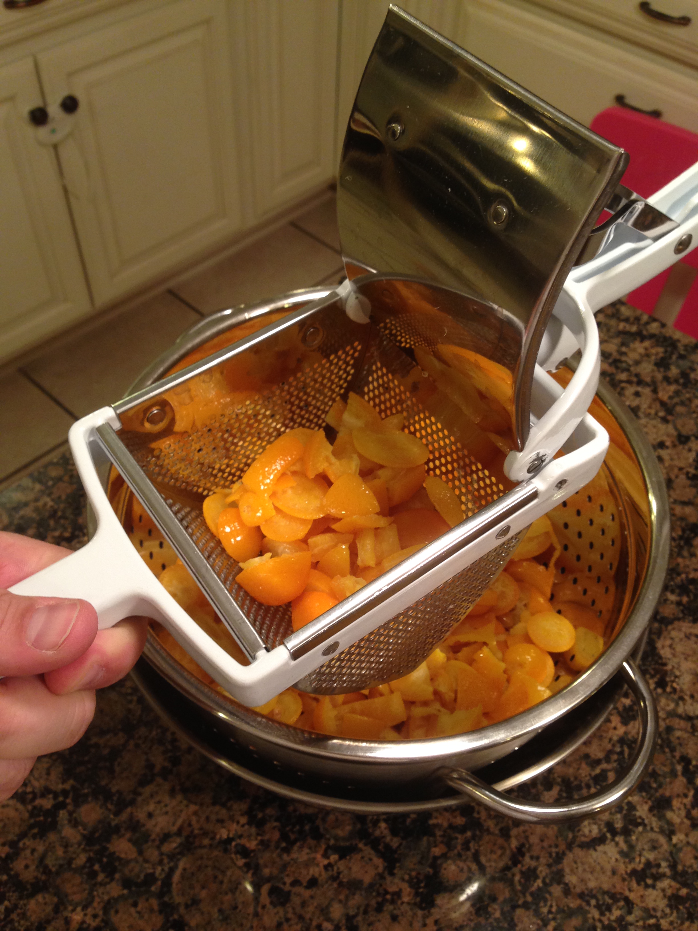 Removing all Liquid from the Kumquats with a Potato Ricer